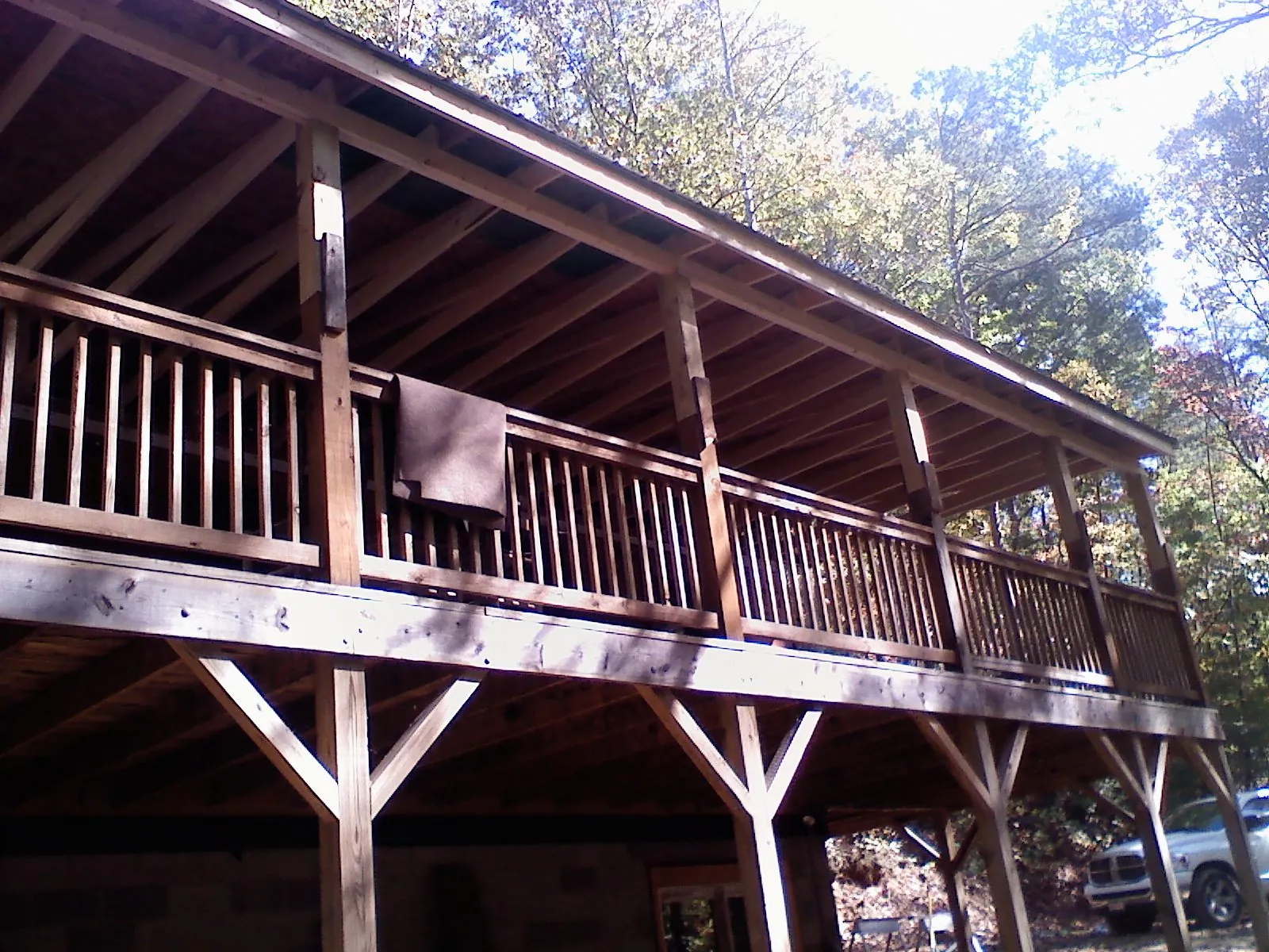 Timber framing under a new elevated porch and deck — Roof Leak Repair in Hurst by Roofing Brothers